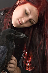 Image showing girl with her raven