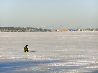 Image showing winter fisherman