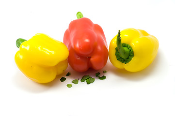 Image showing Yellow and red paprika on the white background