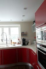 Image showing Red modern kitchen.