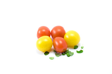 Image showing Yellow and red cherry-tomatos