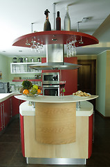 Image showing Red modern kitchen. Interiors.