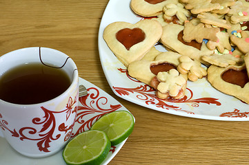 Image showing Cup of tea with cookies