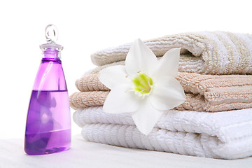 Image showing aromatic oil and towel