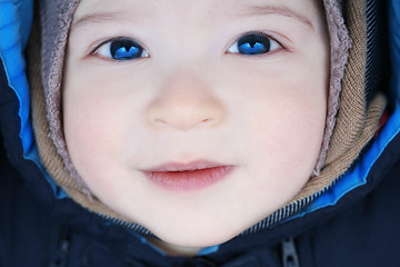 Image showing smiling adorable baby, soft focus