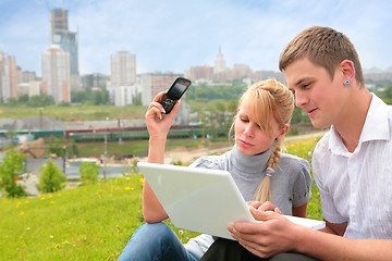 Image showing beautiful blond, yong man and computer