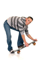 Image showing Handsome smiling skaterboy
