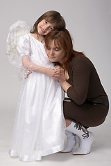 Image showing toddler in angel dress with her mother