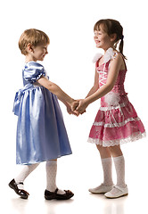 Image showing two girls hold hands of each other