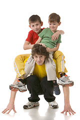 Image showing daddy with two sons