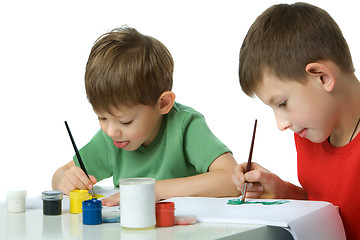 Image showing Two boys draw  gouache