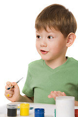 Image showing boy with paints