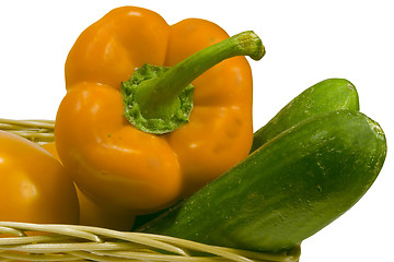 Image showing Basket with vegetables on white background with clipping path