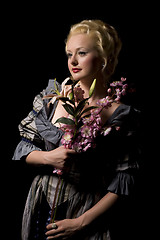 Image showing Lovely woman with flowers