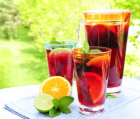 Image showing Fruit punch in pitcher and glasses