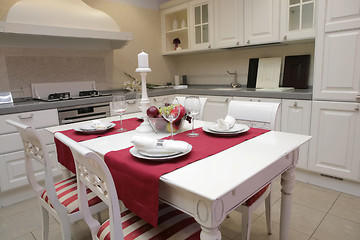 Image showing served table in interior of the trendy cuisine