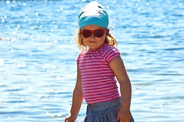 Image showing Little girl at the sea