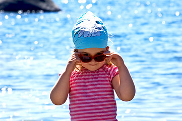 Image showing Little girl at the sea