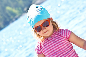 Image showing Little girl at the sea