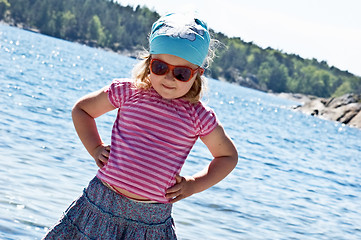 Image showing Little girl at the sea