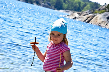 Image showing Little girl at the sea