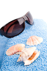 Image showing towel, shells, sunglasses