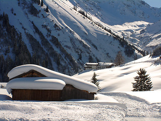 Image showing Alpine hut in snow