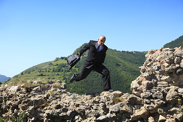 Image showing Businessman running