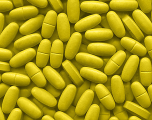 Image showing Yellow pills texture