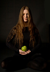Image showing Woman with green apple