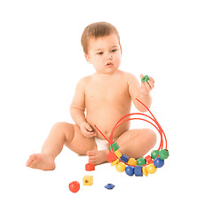 Image showing Boy with multicolored cubes