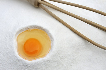 Image showing Flour and eggs ready for mixing