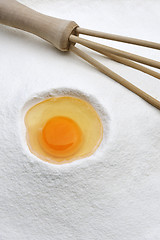 Image showing Flour and eggs ready for mixing