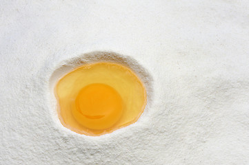 Image showing Flour and eggs ready for mixing