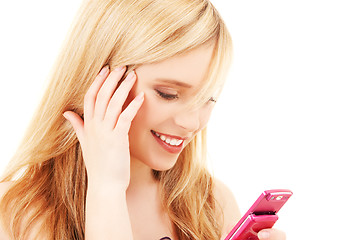 Image showing happy teenage girl with cell phone