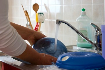 Image showing Washing dishes