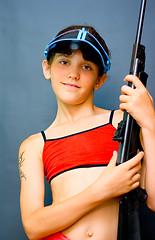 Image showing Teen Girl and gun