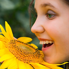 Image showing Smile Girl and sunflower
