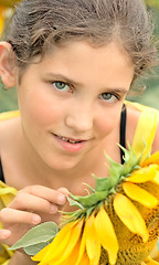 Image showing Beauty teen girl and sunflower