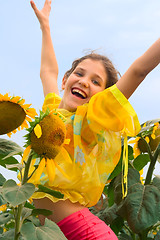 Image showing Smile Girl and sunflower