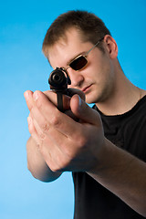 Image showing shooting man