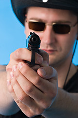 Image showing Man with gun