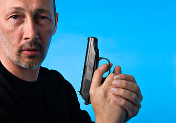 Image showing Man with gun