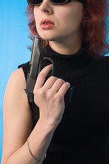 Image showing woman with pistol