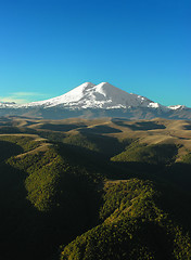 Image showing Snow-covered mountain tops.