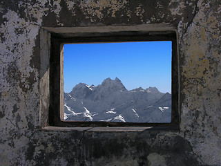 Image showing Kind on mountains from a window