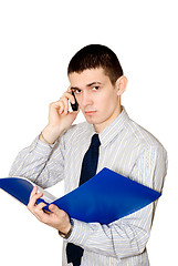 Image showing The young man speaks to phone