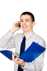 Image showing The young man speaks to phone