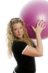 Image showing pretty middle age woman exercising with dumbells