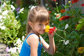 Image showing The girl with flowers